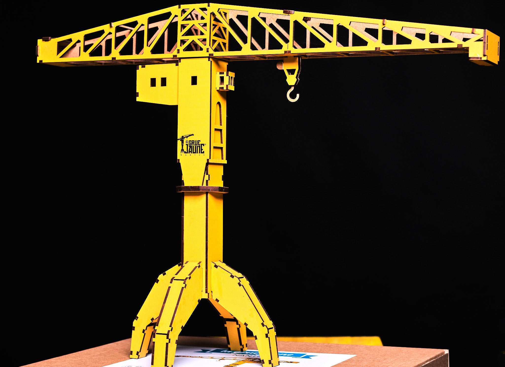 La Grue Jaune en bois à monter